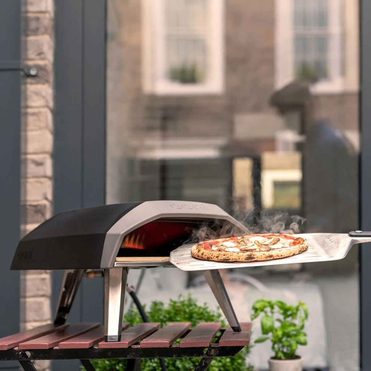 Ooni "Koda 12" Gas Powered Pizza Oven Ooni "Koda 12" Gas Powered Pizza Oven -Traeger Pellet Grills OoniKoda LifestylePizza2 1200x1200 3b6d1a59 ff5f 4ca1 9be7 ddd6d3aac927