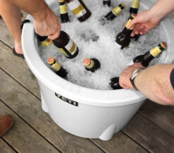 YETI "Tank" 45 - Insulated Ice Bucket 3 YETI "Tank" 45 - Insulated Ice Bucket -Traeger Pellet Grills Tank 45 Hard Cooler Product Overview Image Lifestyle 1x