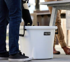 YETI "Tank" 85 - Insulated Ice Bucket 7 YETI "Tank" 85 - Insulated Ice Bucket -Traeger Pellet Grills Tank 85 Hard Cooler Product Overview Image Lifestyle 1x